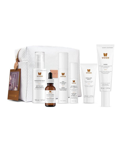 Elegant cosmetic bag with 6 full size products: Medicated Wash, Radiance Serum, Skin Brightening Cream, Exfoliant Forte, Retinol 1% Night Complex and Sheer Broad Spectrum SPF 45.
